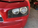 Driver Left Headlight Fits 06-07 Charger 1875538. Fixed Price $130.00.