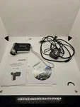 Polaroid DVG-1080P Hd Camcorder Flip Screen Tested + Charger. Fixed Price $24.50.