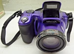 Minolta MN35Z 20MP Digital 35X Optical Zoom Camera W/battery Charger Purple. Fixed Price $74.99.