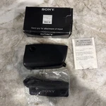 New Original Sony Brand Hand Grip F/ Attachment Of Tripod With Strap Box. Fixed Price $13.00.