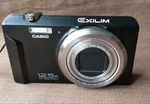 Casio Exilim EX-ZS100 12.5X Zoom Digital Camera Tested Accessories Included. Fixed Price $221.34.