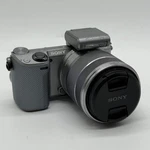 Sony Alpha NEX-5R 16.1MP Compact Mirrorless Digital Camera With Lens. Fixed Price $259.99.