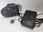 Jvc GR-AX30U Vhs Video Movie Recorder For Parts With Battery Charger. Fixed Price $25.49.