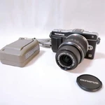 Olympus Pen Mini E-PM2 Black 16.1MP Digital Camera + 14-42MM Lens Kit. Fixed Price $199.99.