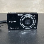 Sony Cyber-shot DSC-WX1 Black 10.2MP Compact Camera Read. Fixed Price $99.99.